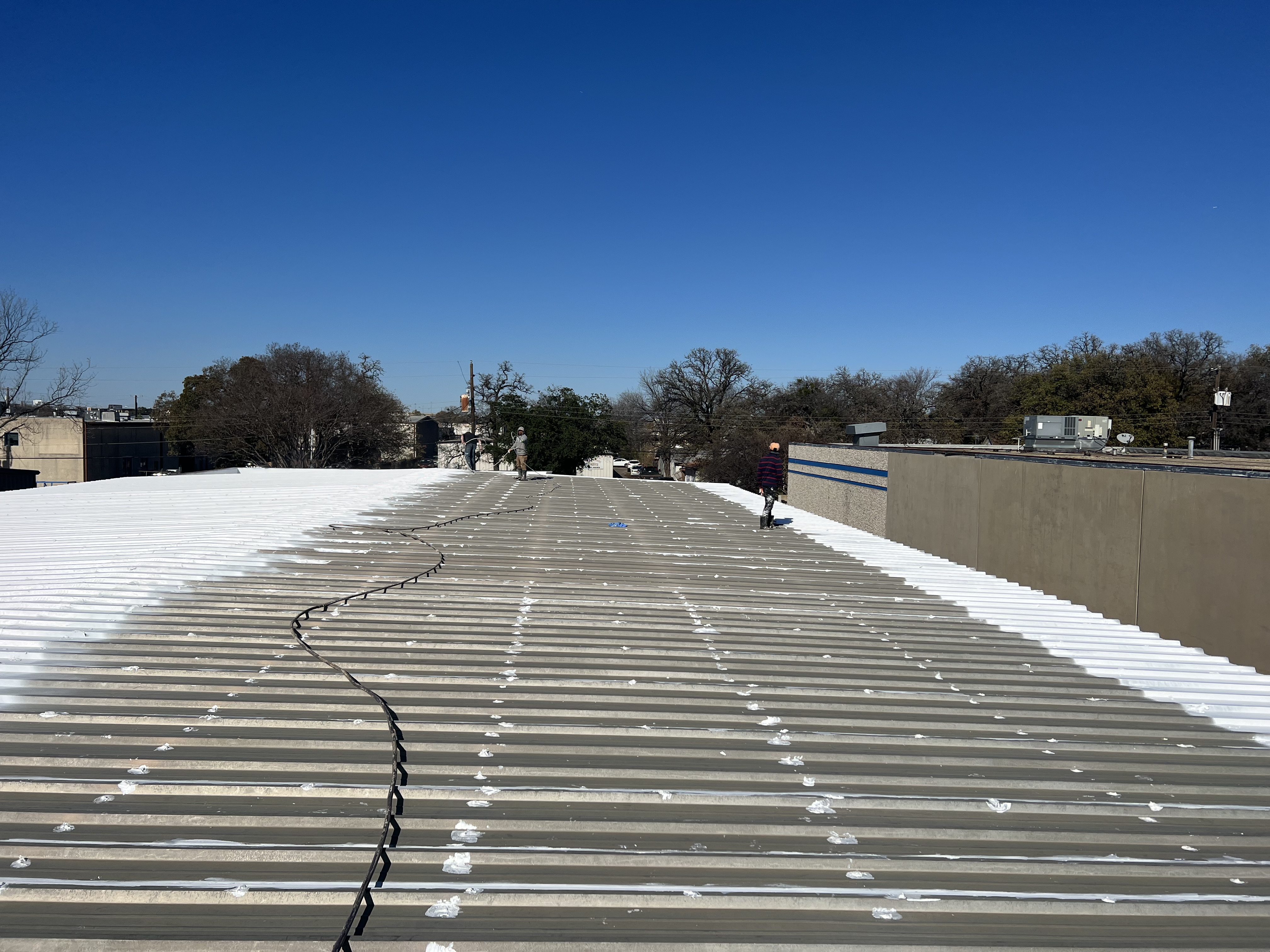 Big commercial roof coating job in Wausau Wisconsin 